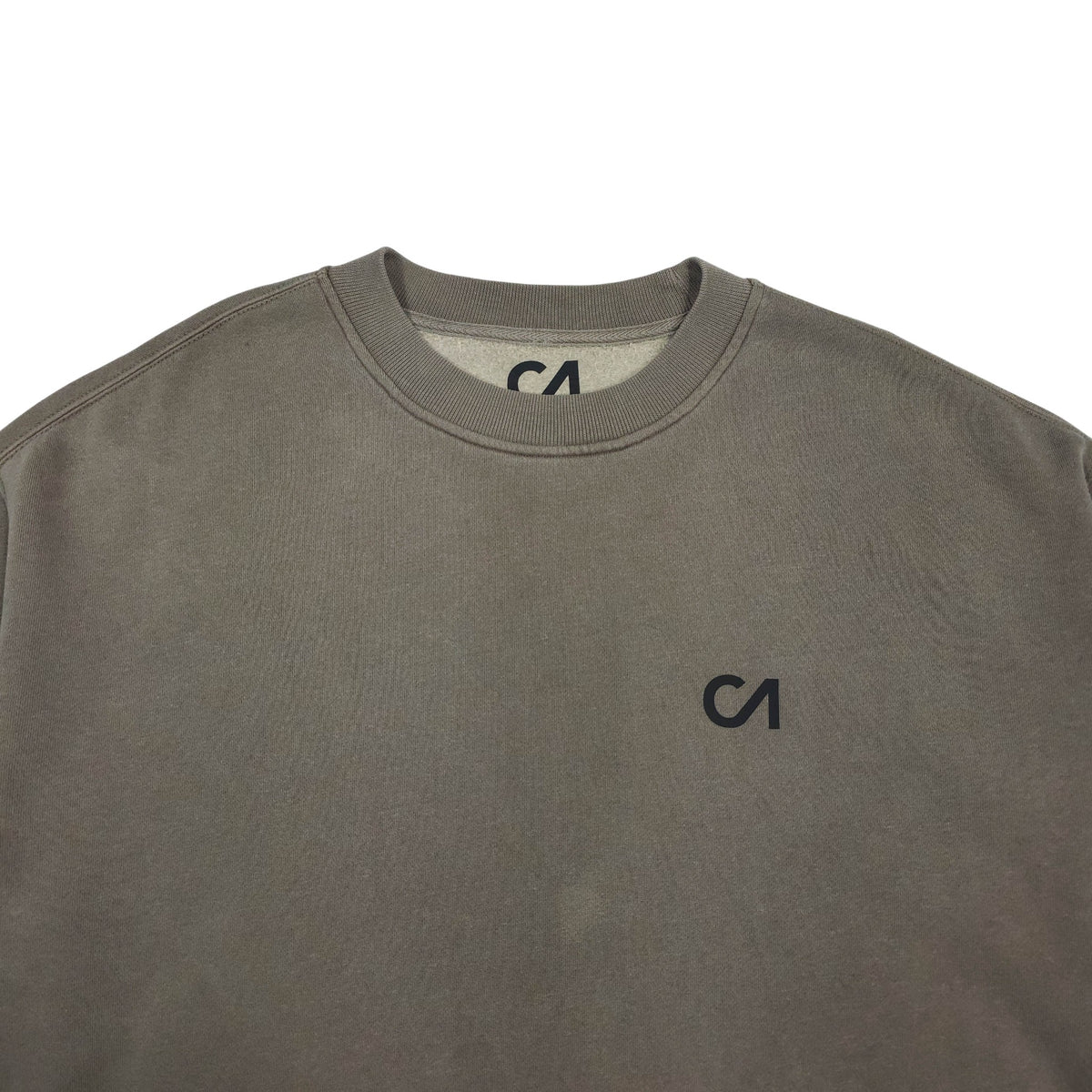 Charcoal crewneck sweatshirt close-up, small CA logo at center chest