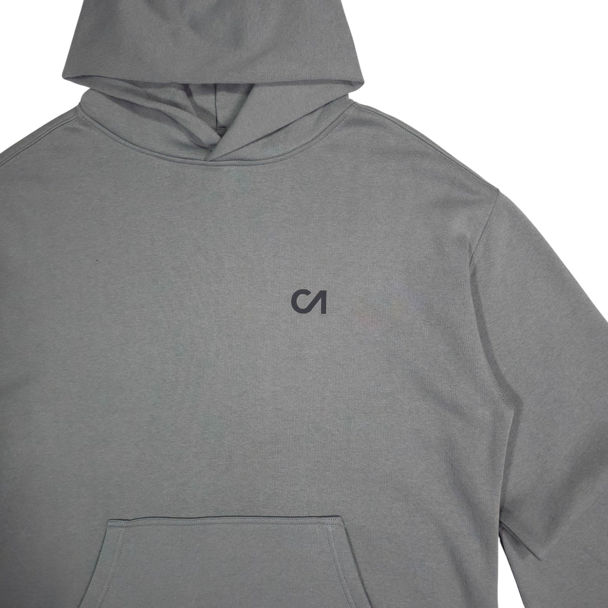 Grey pullover hoodie, chest logo and kangaroo pocket visible