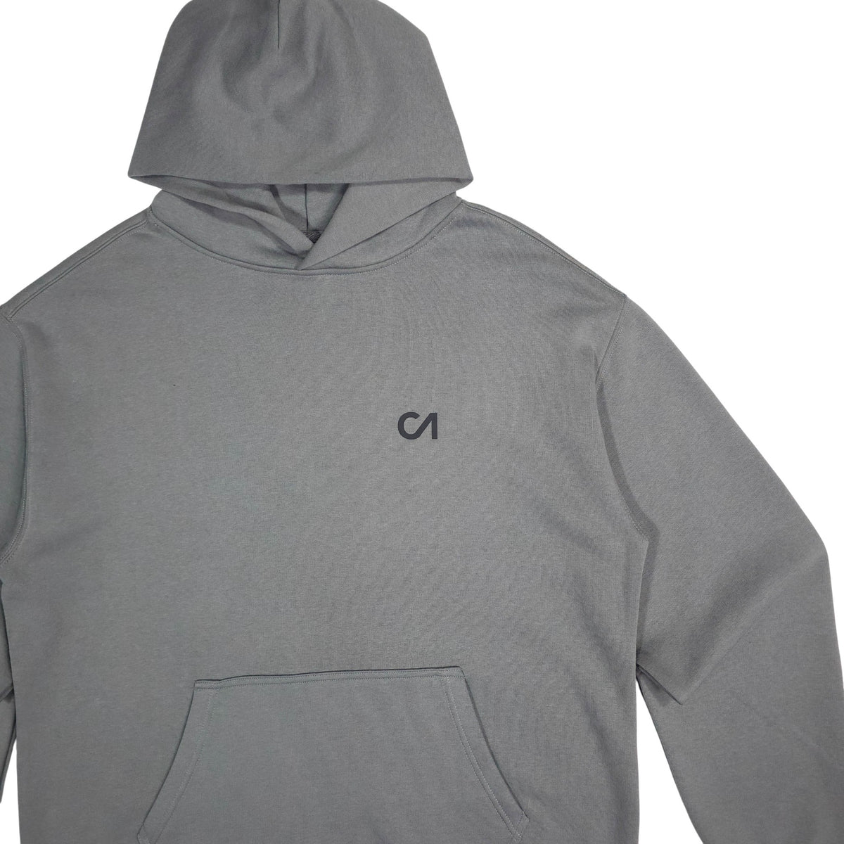 Grey pullover hoodie with hood and small chest logo, close view