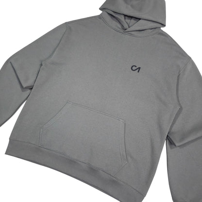 Grey pullover hoodie with hood, chest logo, and kangaroo pocket