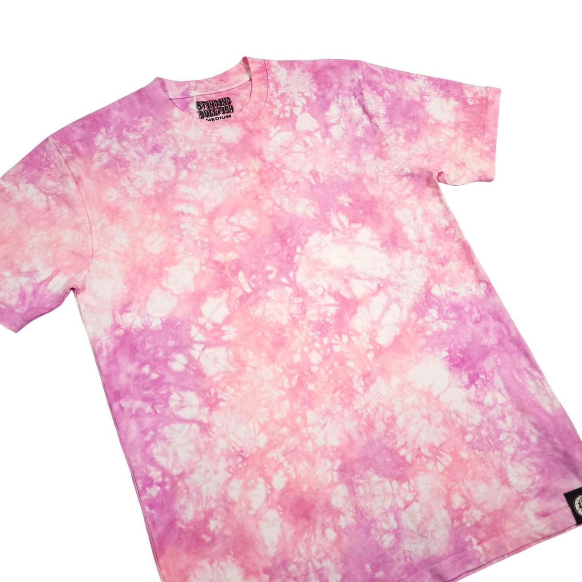 Pink tie-dye T-shirt with crew neck, short sleeves, and small tag logo at hem.