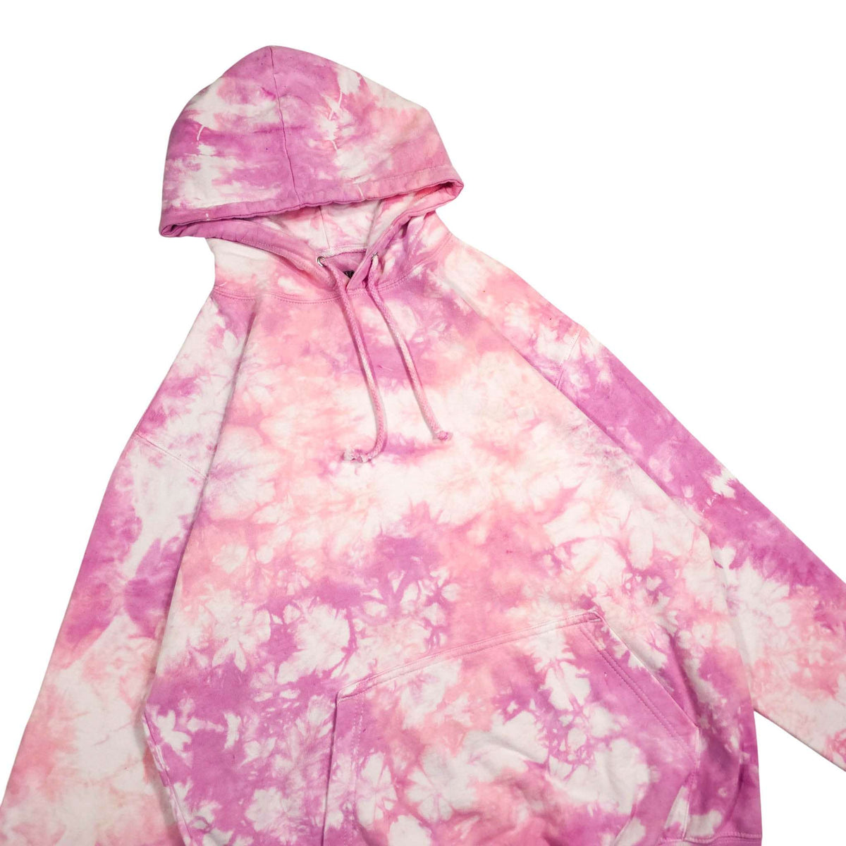 Pink tie-dye pullover hoodie, side front view showing hood and sleeve.