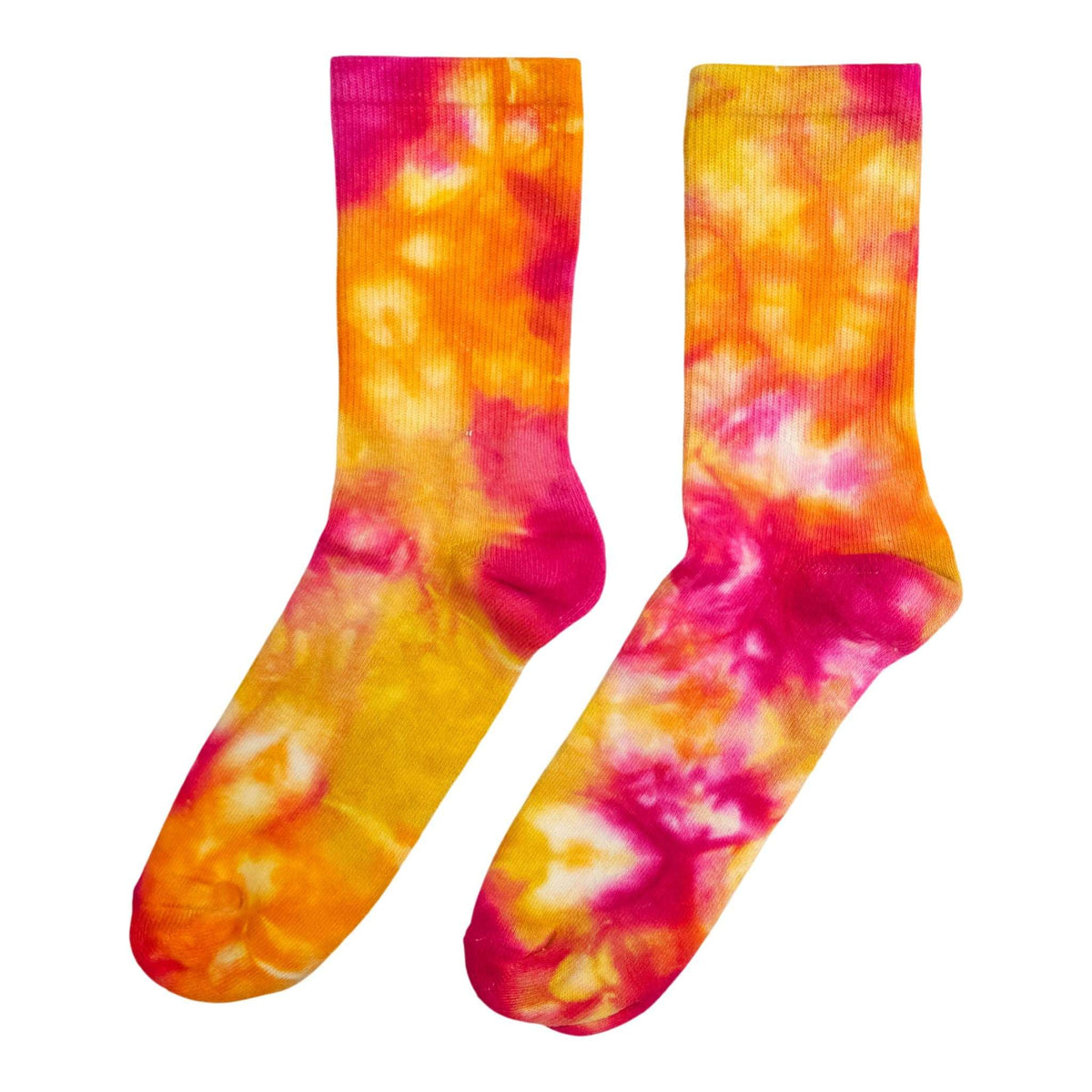 Pair of fruit salad tie-dye crew socks in orange and hot pink