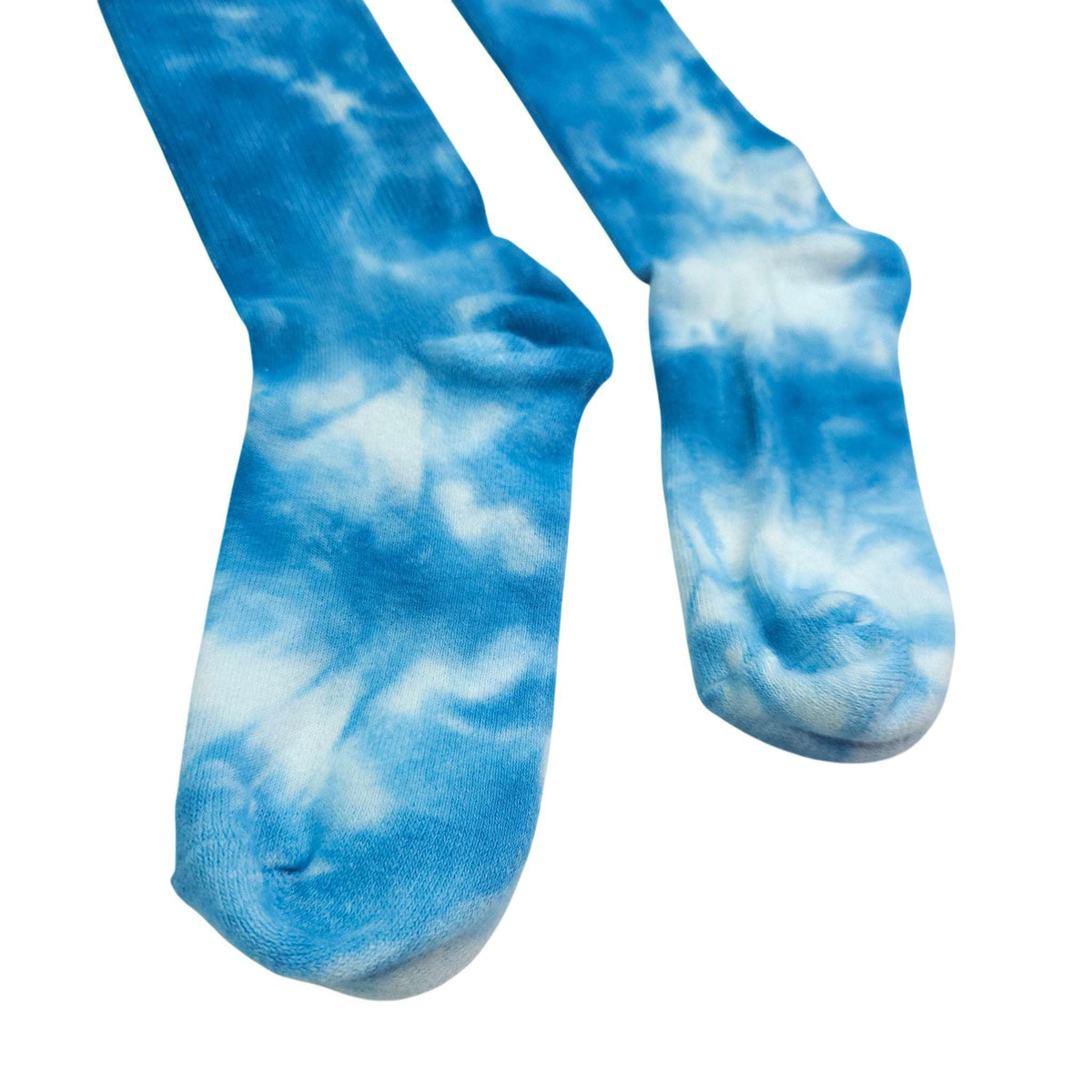 Pair of blue tie-dye crew socks with ribbed cuffs and soft toe