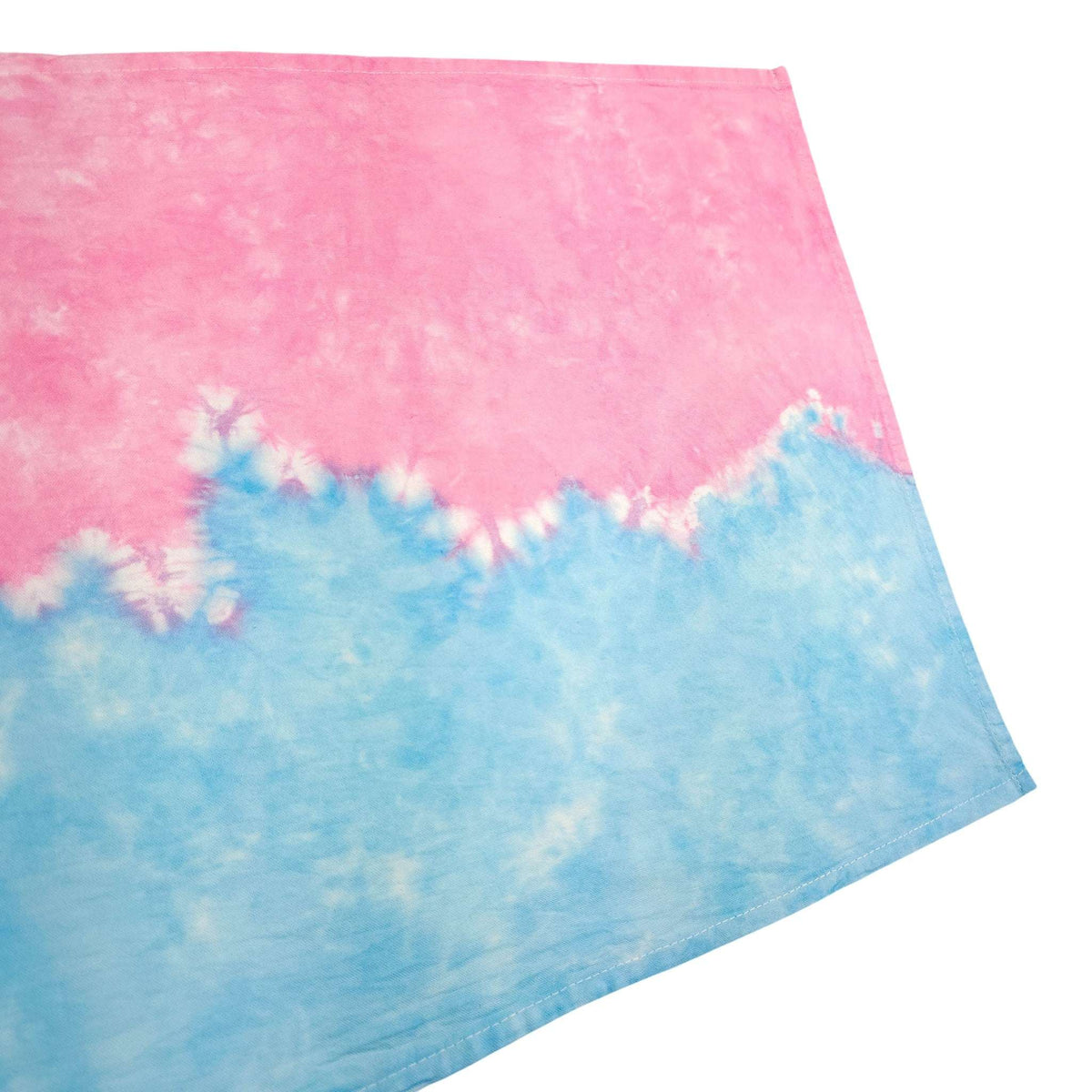 Tie-dye tea towel, close-up of pink upper half blending into blue