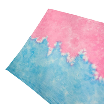 Tie-dye tea towel with blue lower section and pink upper section, wavy tie-dye