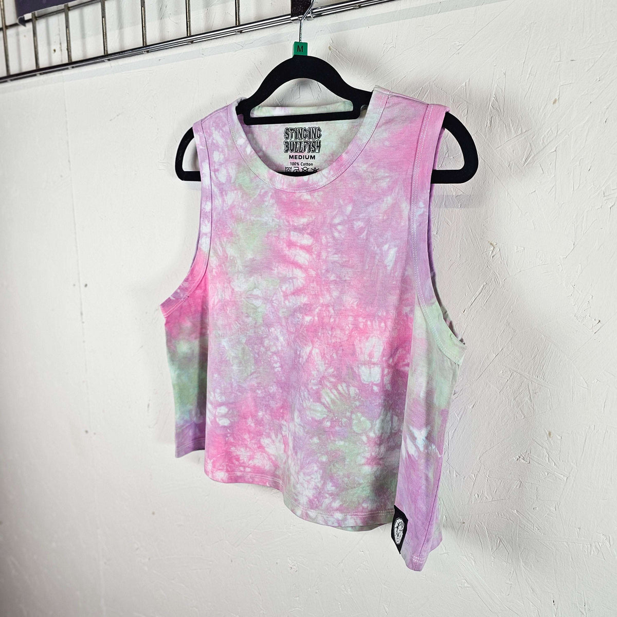 Pastel tie-dye sleeveless crop vest with crew neck, pink front and mint side panels