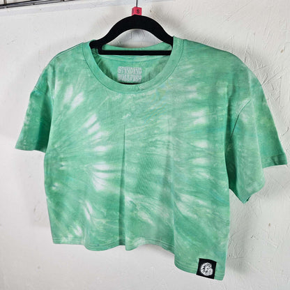 Mint green tie-dye crop top with crew neck and short sleeves, side patch