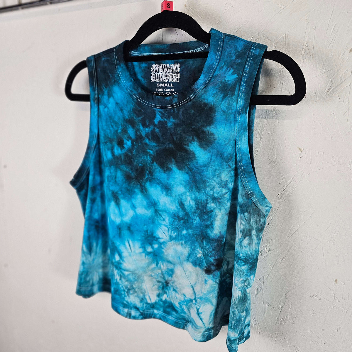 Blue tie-dye sleeveless crop vest, side view, crew neck