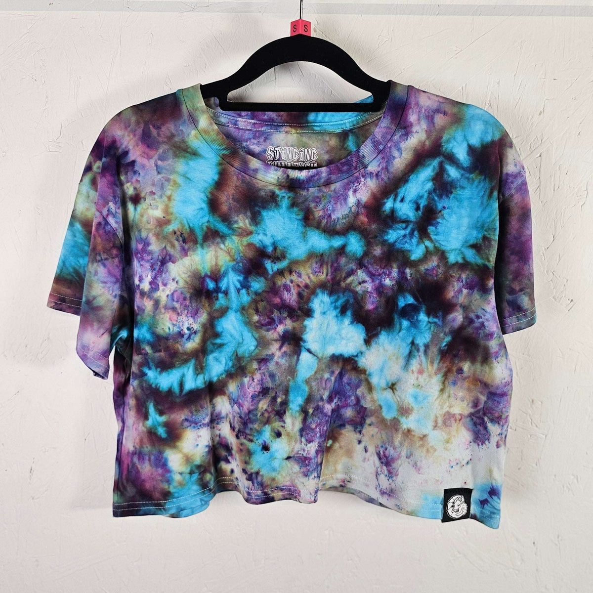 Turquoise and purple tie-dye crop top, short sleeves, crew neck, small hem patch