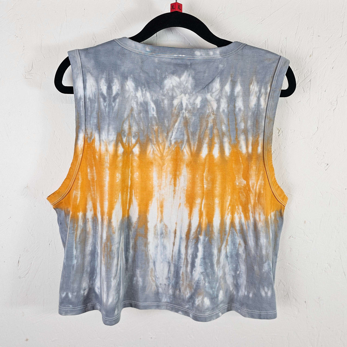 Blue and orange tie-dye crop vest, sleeveless crew neck, back view