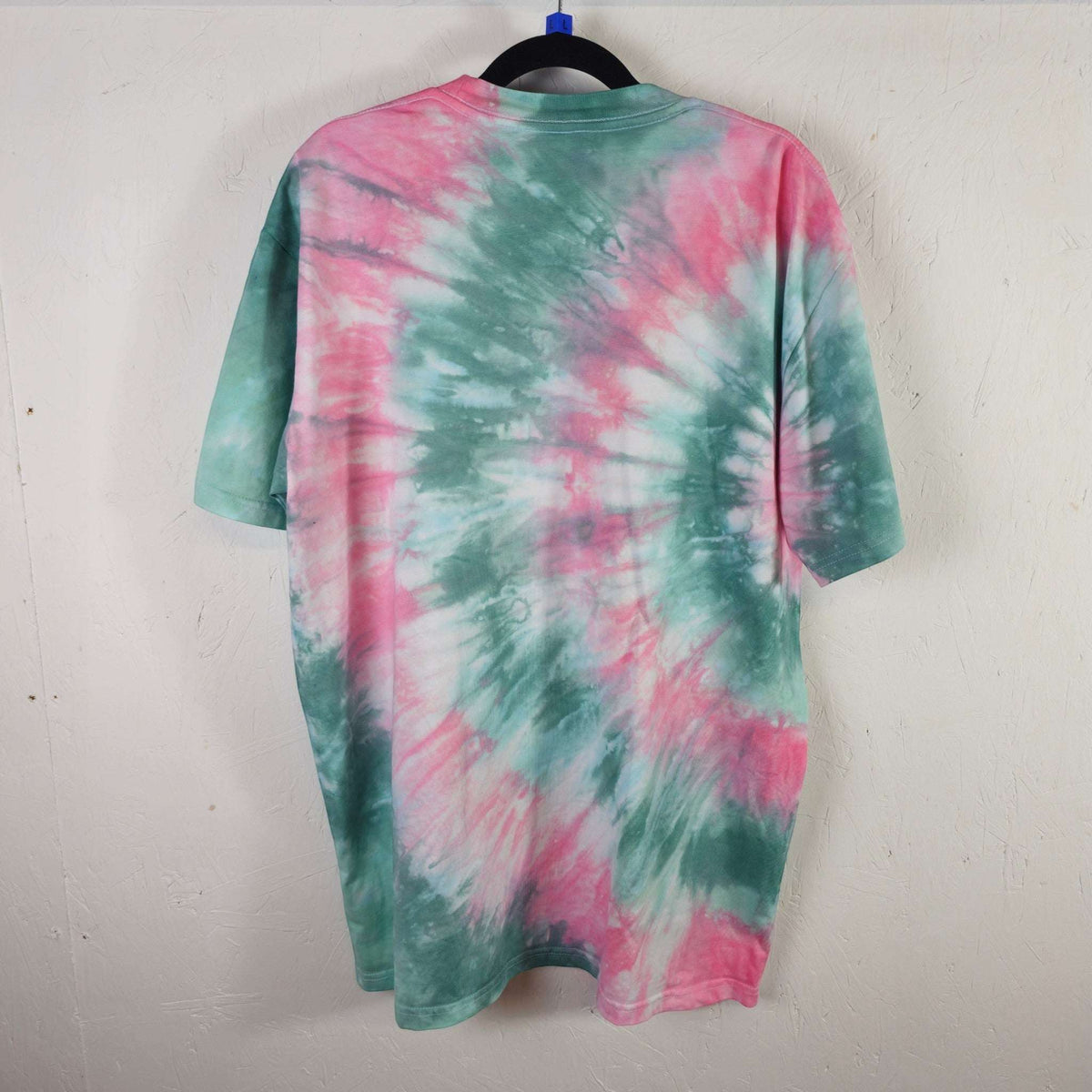 Pink and green tie-dye T-shirt, crew neck and short sleeves (back view)