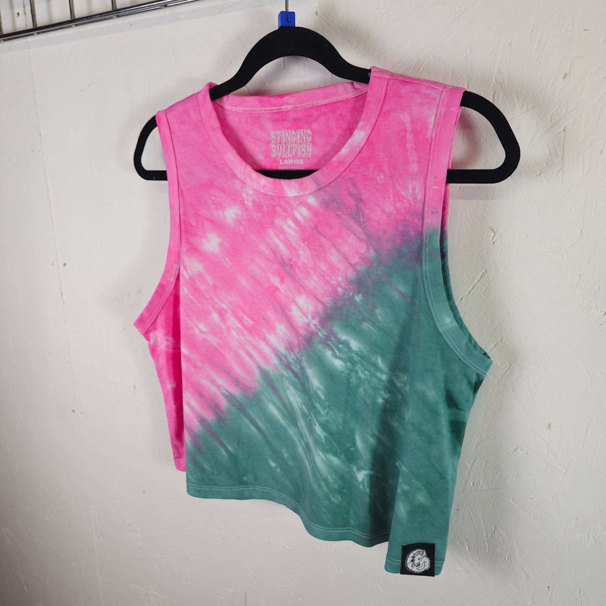 Pink and teal tie-dye crop vest, sleeveless crew neck, side tag