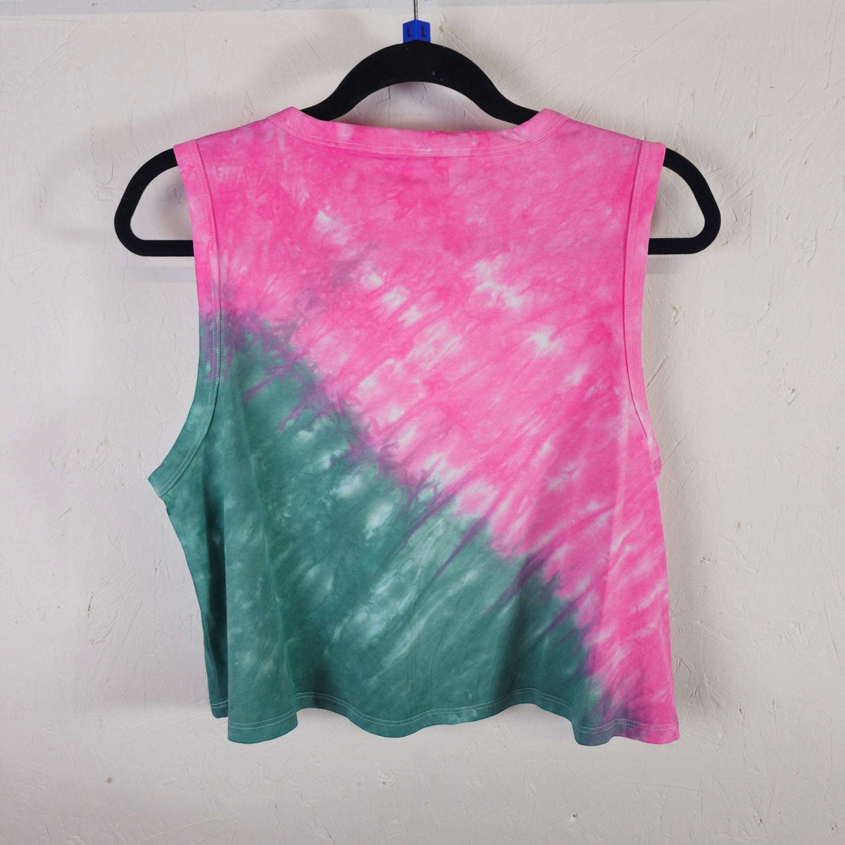 Pink and teal tie-dye crop vest back view with sleeveless crew neck