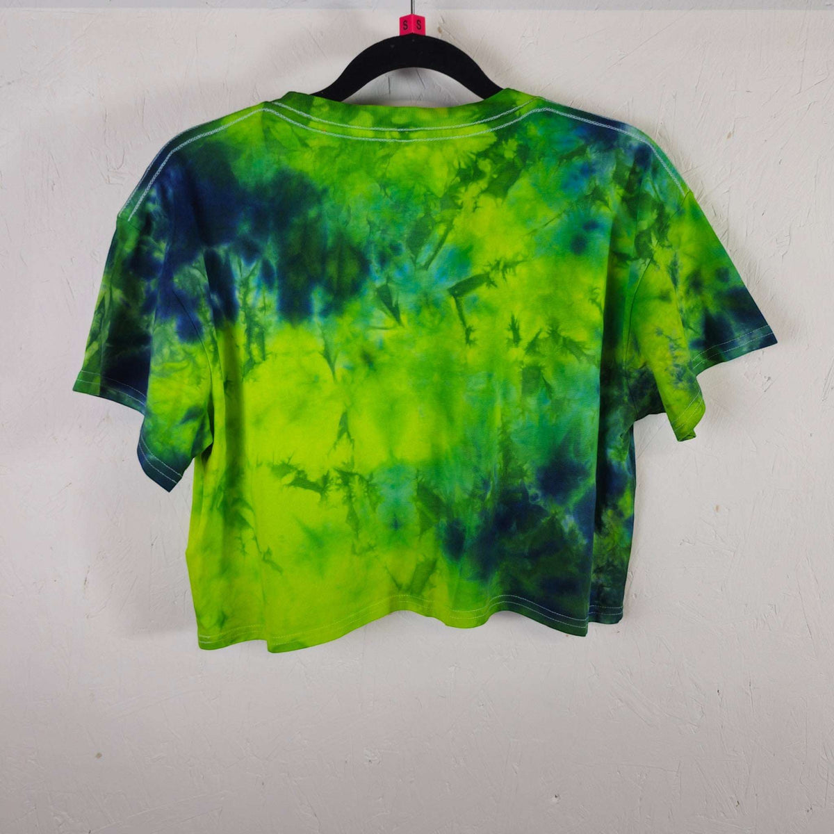 Back view green and blue tie-dye crop top with short sleeves and crew neck