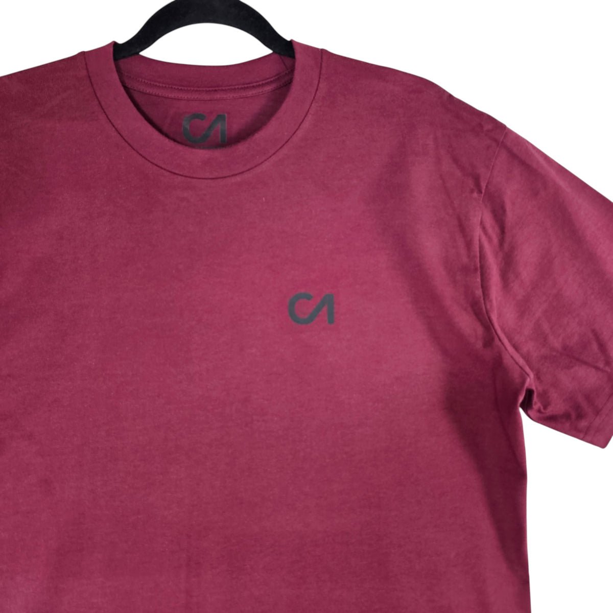 Berry maroon crew-neck T-shirt with small center chest logo detail