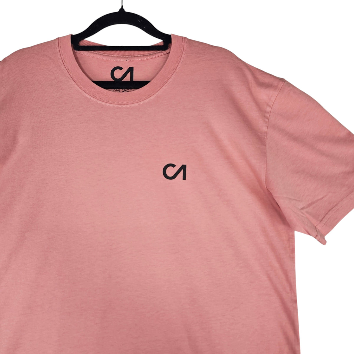 Pink T-shirt close-up: CA logo on crew neck chest