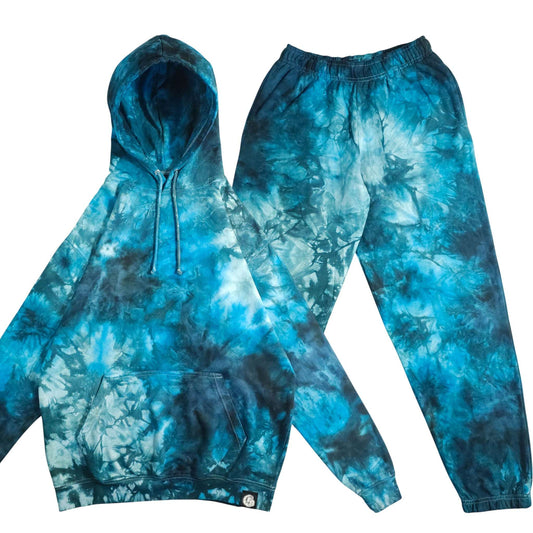 Blue tie-dye tracksuit set with pullover hoodie and jogger pants, drawstring hood