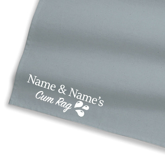 Light blue-gray personalized rag close-up with Name & Name's text and icon
