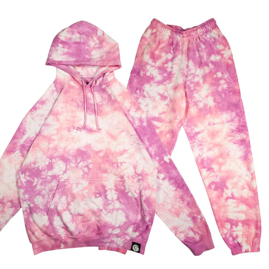 Pink tie-dye hoodie and jogger tracksuit set, front view with hood and drawstring